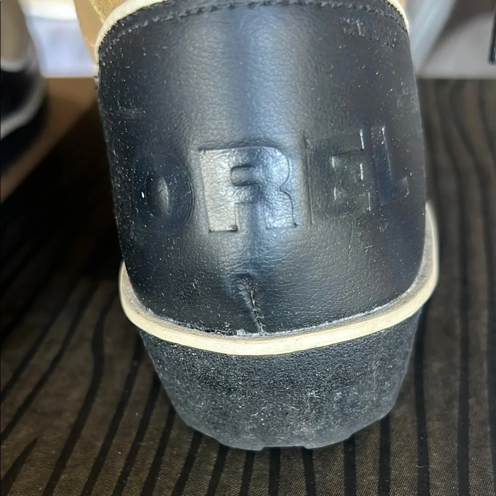 Sorel Tan and Black Winter Rain Boots Durable Design